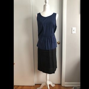 High chest. Low back, loose fitting tank